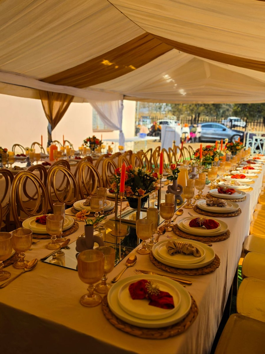 Long table styling with gold chairs